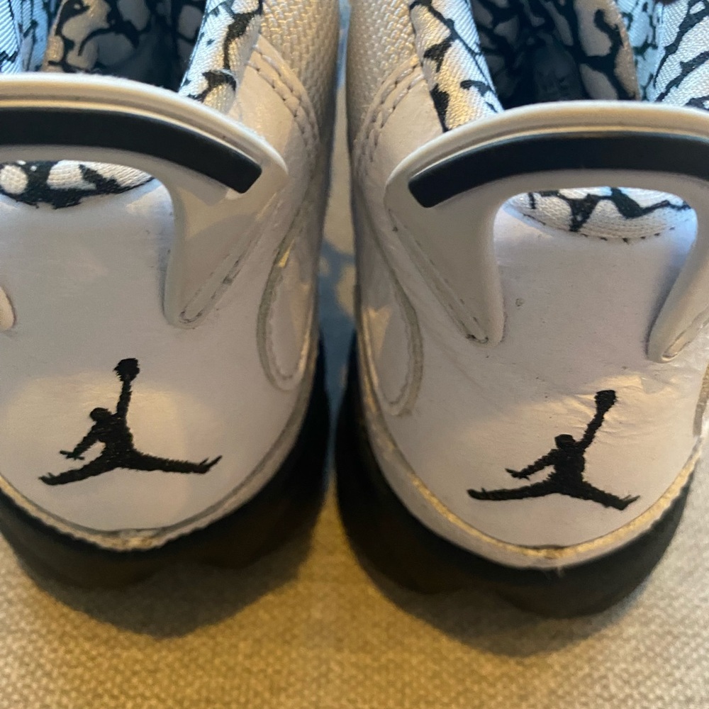 Jordan White and Black Sneakers with Iconic Jumpman Logo